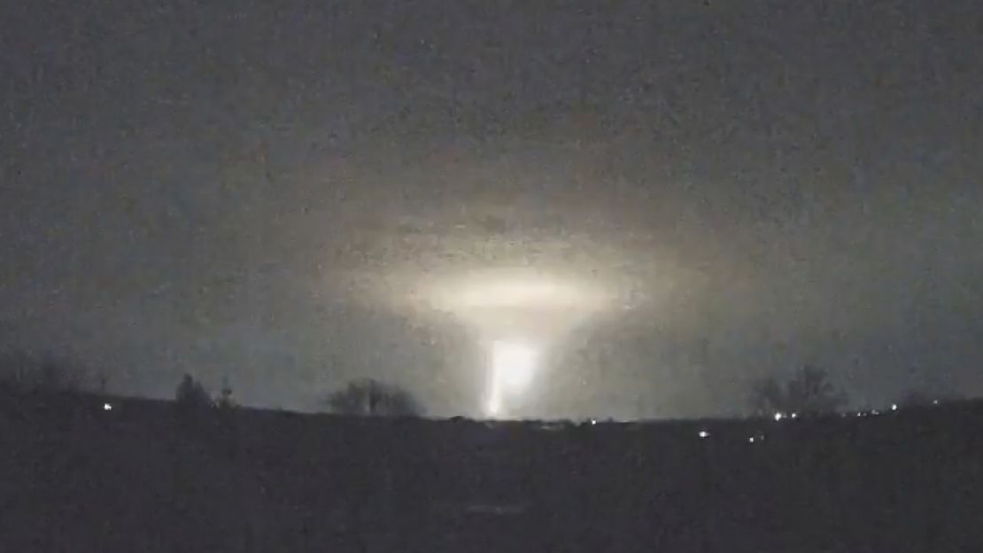 In this screen grab from a video provided by the Come Back Alive Foundation on November 21, 2024, lights are seen in the sky during a Russian attack on Dnipro, Ukraine.